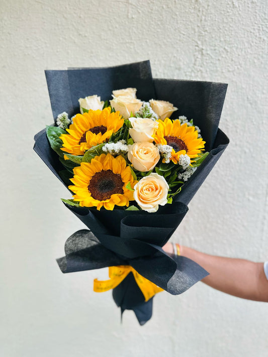 Roses and sunflowers hand bouquet by BloomOnly who is a premium number 1 florist in pune that delivers same day