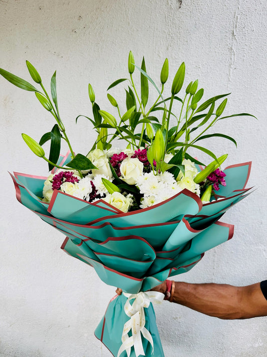 Mix flowers hand bunch by BloomOnly who is a premium number 1 florist in pune that delivers same day