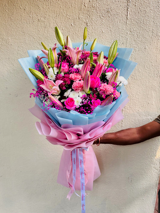 Mix flowers hand bunch by BloomOnly who is a premium number 1 florist in pune that delivers same day