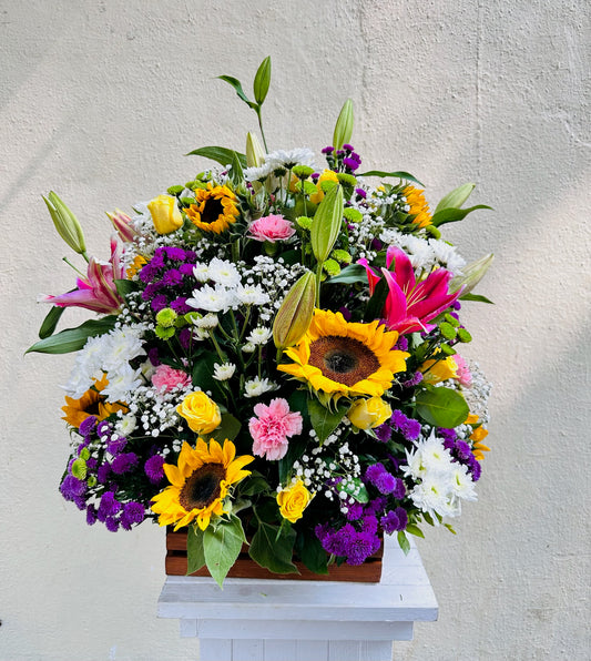 Wooden basket mix flowers by BloomsOnly, Pune's number 1 flower delivery website