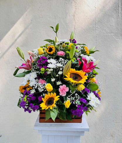 Wooden basket mix flowers by BloomsOnly, Pune's number 1 flower delivery website