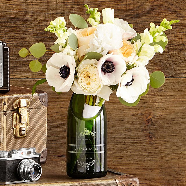 flowers in champagne bottles vase